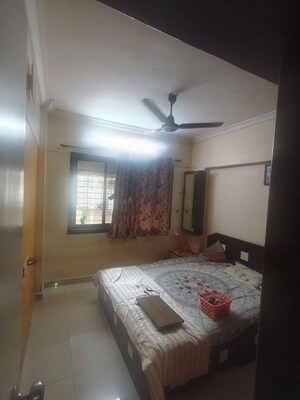 Bedroom in 1 BHK Apartment at Kamala Ashish Tower, Kandivali West – for Rent