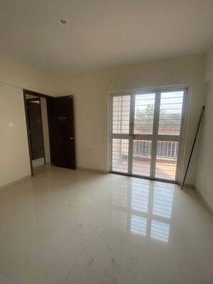 Room in 2 BHK Apartment at Urban Skyline Phase 1, Ravet – for Sale