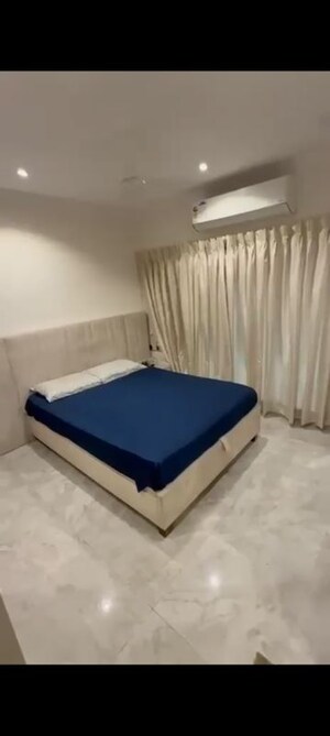 Bedroom in 2 BHK Apartment at Svarna Rosemary, Mahim West – for Rent