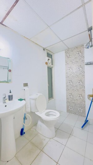 Bathroom in 2 BHK Apartment at Sikka Karmic Greens, Sector 78 – for Rent