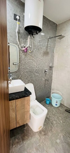 Bathroom in 1 RK Apartment at Ansal API Happy Homes, Sector 42 – for Rent