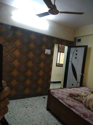 Bedroom in 2 BHK Apartment at Ashokvan Apartments, Dahisar East – for Rent