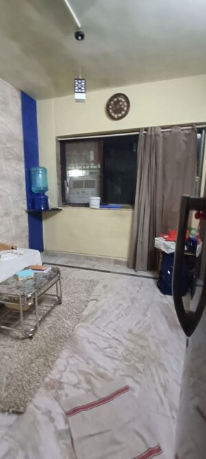 Living Room in 2 BHK Apartment at Kaveri CHS Santacruz, Santacruz East – for Sale