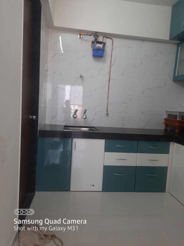 Kitchen, rkh-blessings 2 Bedroom 718 Sq.Ft. Apartment In Moshi Pune 10498840