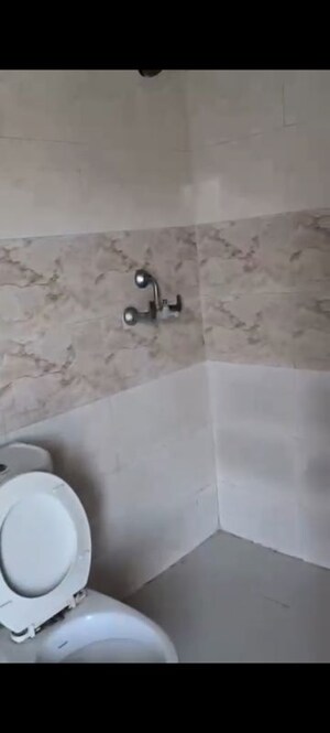 Bathroom in 2 BHK Apartment at Charms Castle, Raj Nagar Extension – for Sale