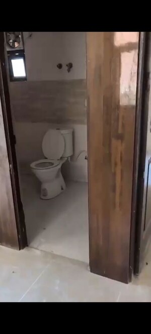 Bathroom in 2 BHK Apartment at Charms Castle, Raj Nagar Extension – for Sale