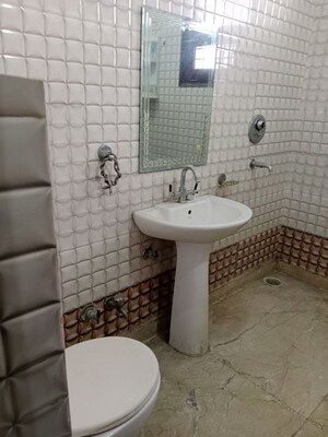 Bathroom in 3.5 BHK Builder Floor at Ansals Sushant City – for Rent