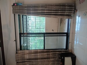 Room in 2 BHK Apartment at New Brahmand Phase 7 CHS, Brahmand – for Rent
