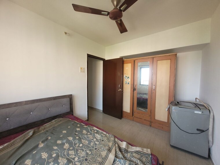 Bedroom, raunak-unnathi-woods-phase-4-and-5 2 Bedroom 680 Sq.Ft. Apartment In Ghodbunder Road Thane 10493700