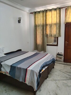 Bedroom in 3 BHK Builder Floor at Sushant Lok I – for Rent