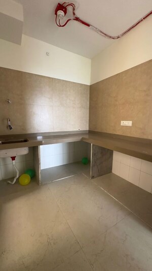Kitchen in 2 BHK Apartment at Dosti West County, Balkum Pada – for Rent