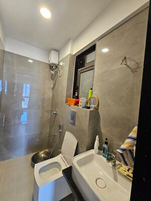 Bathroom in 2 BHK Apartment at Dev Leo Tower, Oshiwara – for Rent