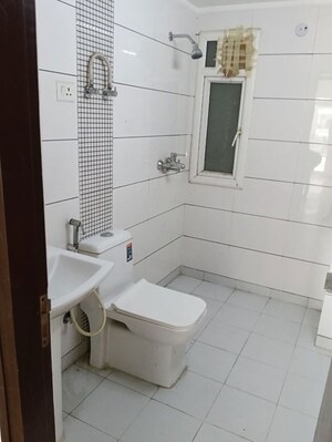 Bathroom in 3 BHK Apartment at Gulshan Ikebana, Sector 143 – for Sale