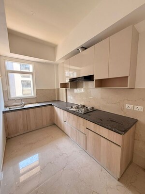 Kitchen in 2 BHK Apartment at Smart World Orchard, Sector 61 – for Sale