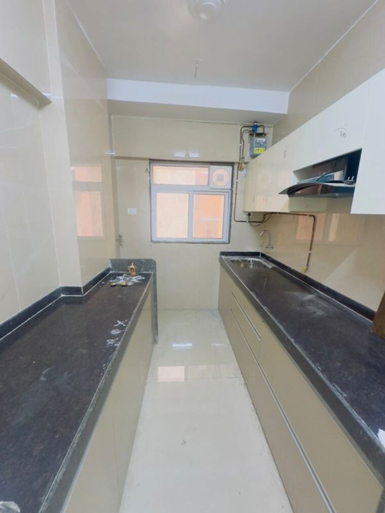 Kitchen, avigna-chs 2 Bedroom 800 Sq.Ft. Apartment In Chembur Mumbai 10499413