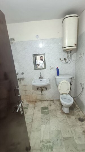 Bathroom in 3 BHK Apartment at Dwarka – for Rent