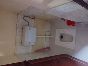 Bathroom in 2 BHK Apartment at Vasundhara Sector 4 – for Sale
