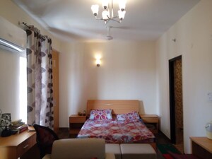 Bedroom in Studio Apartment at Supertech Czar Suites, Omicron I Greater Noida – for Rent