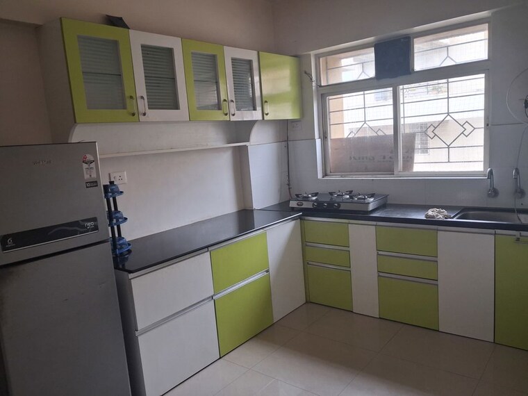 Kitchen, palladium-homes 1 Bedroom 610 Sq.Ft. Apartment In Dhanori Pune 10499607