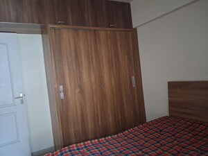 Bedroom in 1 BHK Apartment at Palladium Homes, Dhanori – for Rent