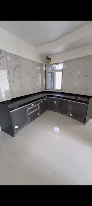 Kitchen in 2 BHK Apartment at Deraiya Classico, Kurla East – for Rent