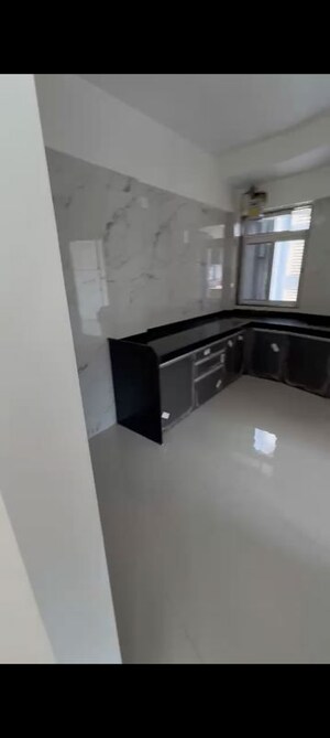 Kitchen in 2 BHK Apartment at Deraiya Classico, Kurla East – for Rent