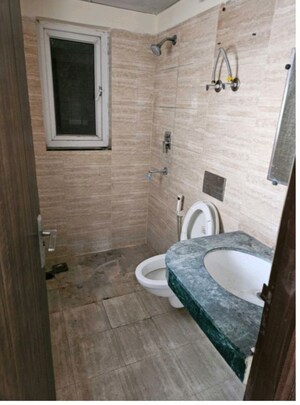 Bathroom in 3 BHK Apartment at BPTP Discovery Park, Sector 80 – for Rent