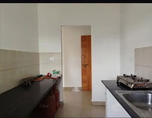 Kitchen in 2 BHK Apartment at Provident Sunworth, Mysore Road – for Sale