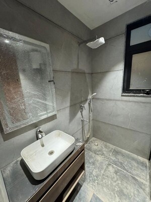 Bathroom in 4 BHK Apartment at Dwarka – for Rent