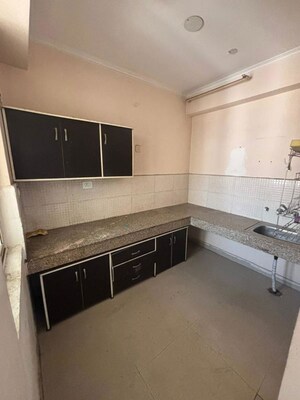 Kitchen in 2 BHK Apartment at Supertech Eco Village II, Sector 16b Greater Noida – for Rent