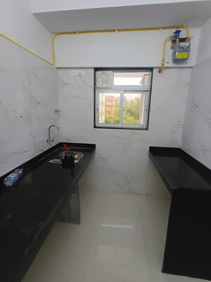 Kitchen in 1 BHK Apartment at Dem Phoenix, Malad East – for Rent