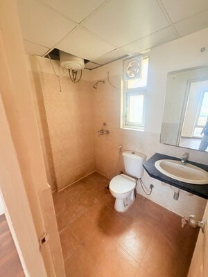 Bathroom in 3 BHK Apartment at Piedmont Taksila Heights, Sector 37c – for Rent