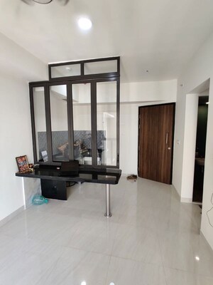 Living Room in 1 BHK Apartment at Lodha Quality Home Tower 2, Majiwada – for Rent