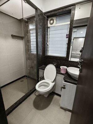 Bathroom in 1 BHK Apartment at Rizvi Cedar, Malad East – for Rent