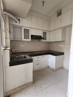 Kitchen in 2 BHK Apartment at Tata Eureka Park, Sector 150 – for Rent