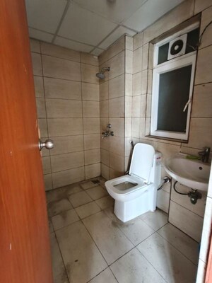 Bathroom in 2 BHK Apartment at Tata Eureka Park, Sector 150 – for Rent
