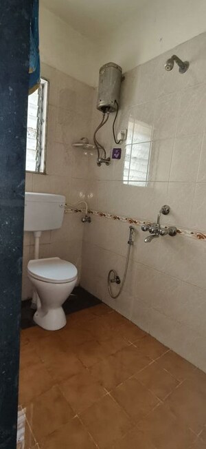 Bathroom in 2 BHK Apartment at Vedant Complex CHS, Samata Nagar – for Rent