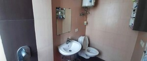 Bathroom in 3 BHK Apartment at Ramprastha City The Atrium, Sector 37d – for Rent