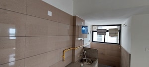 Kitchen in 2 BHK Apartment at Sun Footprints, Shela – for Rent