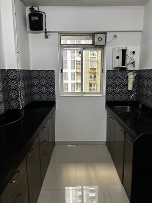 Kitchen in 1 BHK Apartment at Lodha Amara, Kolshet Road – for Rent