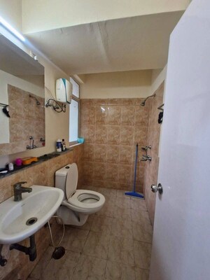 Bathroom in 3 BHK Apartment at Omkar Royal Nest, Tech Zone 4 Greater Noida – for Rent
