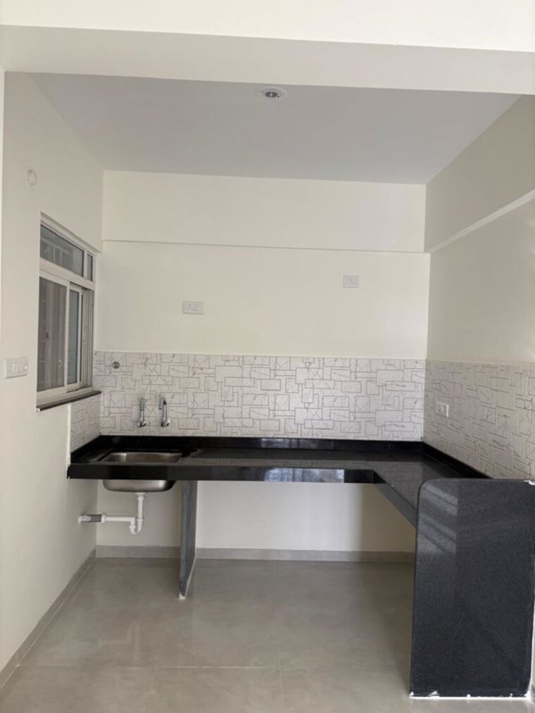 Kitchen, kamgar putala vasahat 2 Bedroom 1000 Sq.Ft. Apartment In Kamgar Putala Vasahat Pune 10499521