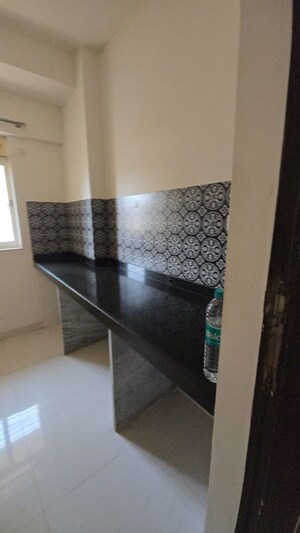 Kitchen in 1 BHK Apartment at Lodha Amara, Kolshet Road – for Sale