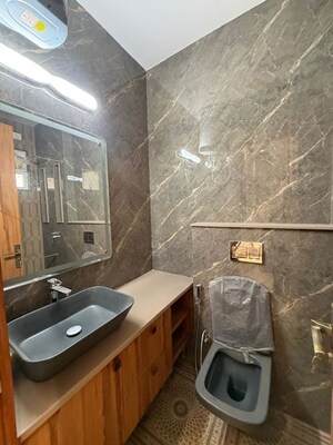 Bathroom in 3 BHK Builder Floor at Kalkaji – for Rent