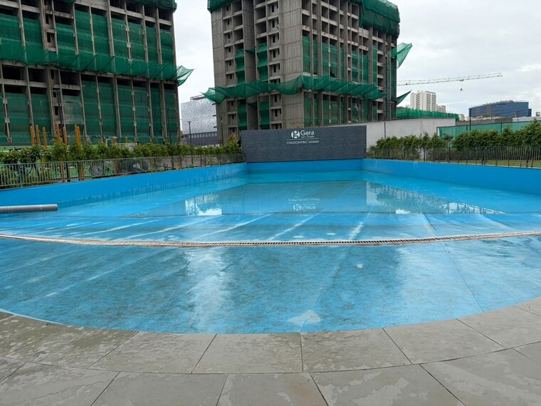 Swimming Pool, gera-planet-of-joy 2 Bedroom 790 Sq.Ft. Apartment In Kharadi Pune 10500995