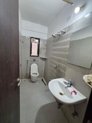 Bathroom in 2 BHK Apartment at Kundan Paradise, Aundh – for Rent