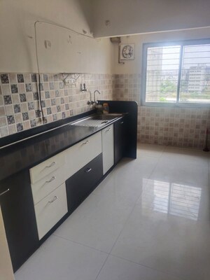 Kitchen in 2 BHK Apartment at Aarohi Park Ravet, Ravet – for Rent