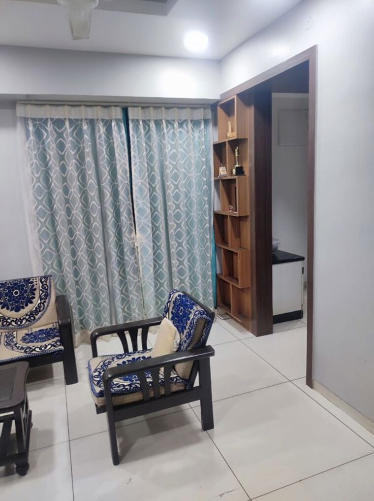 Living Room, phadnis-sahil-saga 2 Bedroom 850 Sq.Ft. Apartment In Baner Pune 10501031