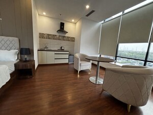 Living Room in Studio Apartment at Urbtech NPX, Sector 153 – for Sale