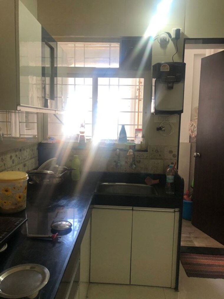 Kitchen, darode-q-homes 2 Bedroom 950 Sq.Ft. Apartment In Kharadi Pune 10501107